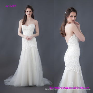 Beautiful Beaded Flower Lace Wedding Gown with a Fitted Long Line Bodice and a Layered Tulle Skirt